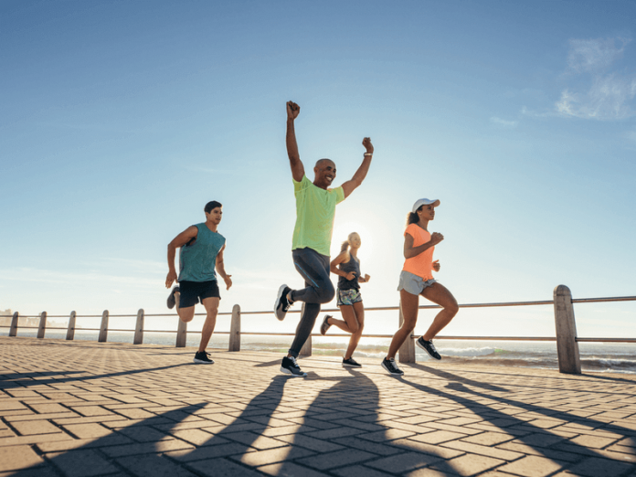 Photo of people running well