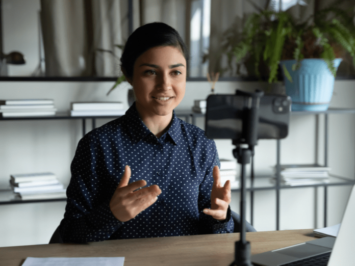 young woman giving a virtual presentation