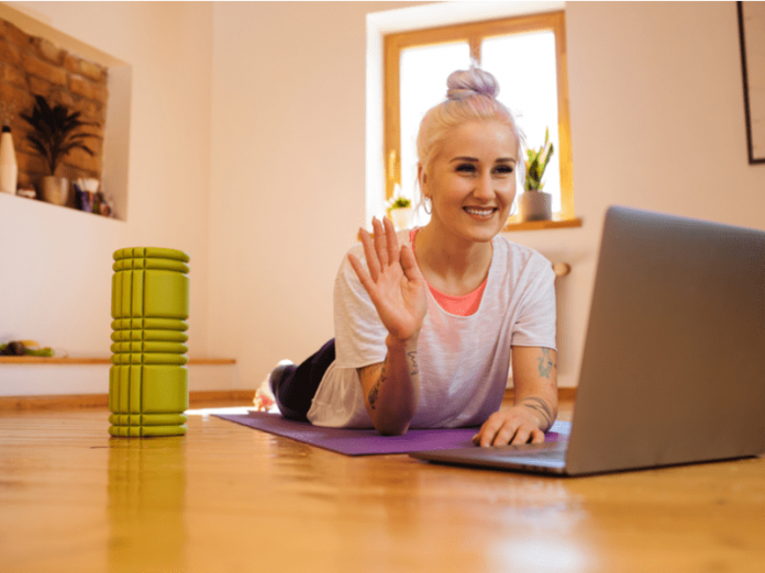 Photo of a woman doing a virtual workout