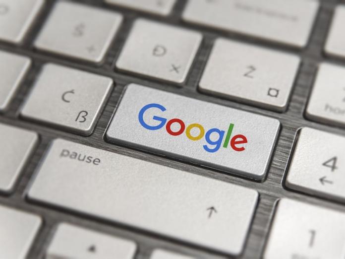 a keyboard with a google button. Google is capitalized
