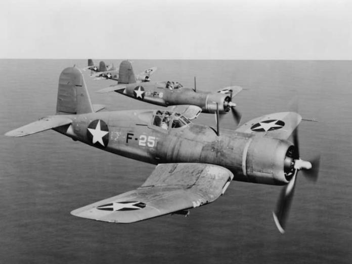 A black and white picture of WWII airplanes