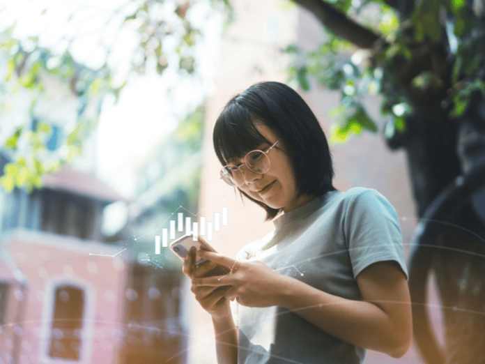 Woman investing in crypto