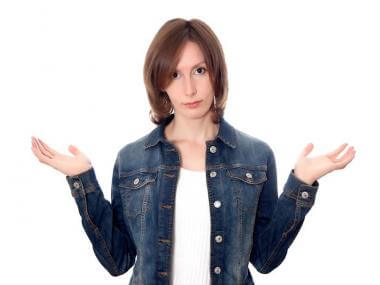A woman gesturing as if "it is what it is"
