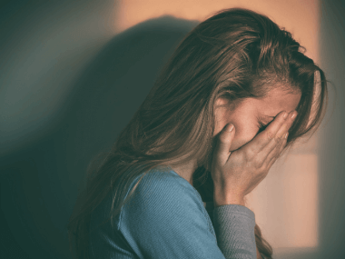 a woman feeling guilty