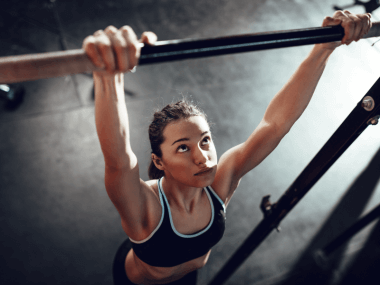 Photo of a woman too tired to do a chin-up