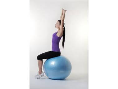 woman doing lunge using stability ball