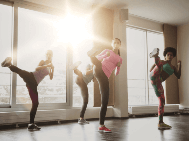 Photo of four women doing bodycombat