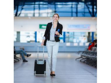 womantravelingairportjpgitokEfZPb