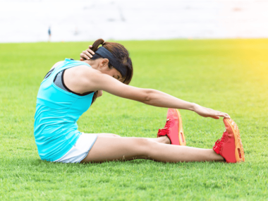 woman stretching calf