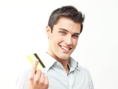 smilingmanwithcreditcardjpgitoknIOdU