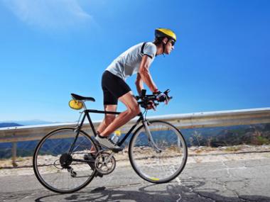 Cyclist riding a bicycle outdoors