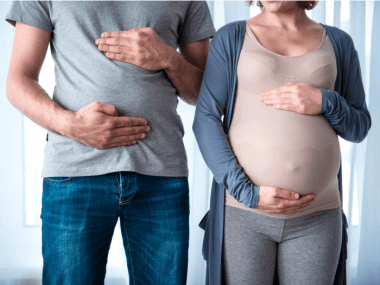 man has empathy for pregnant partner 