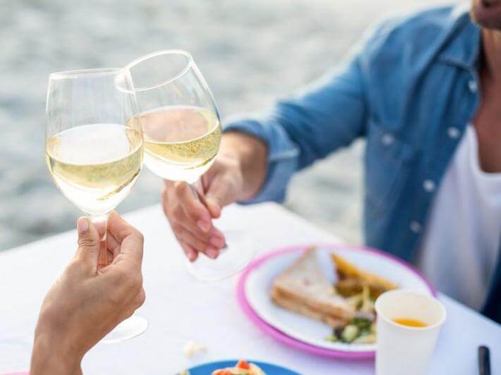 A couple toasting their anniversary