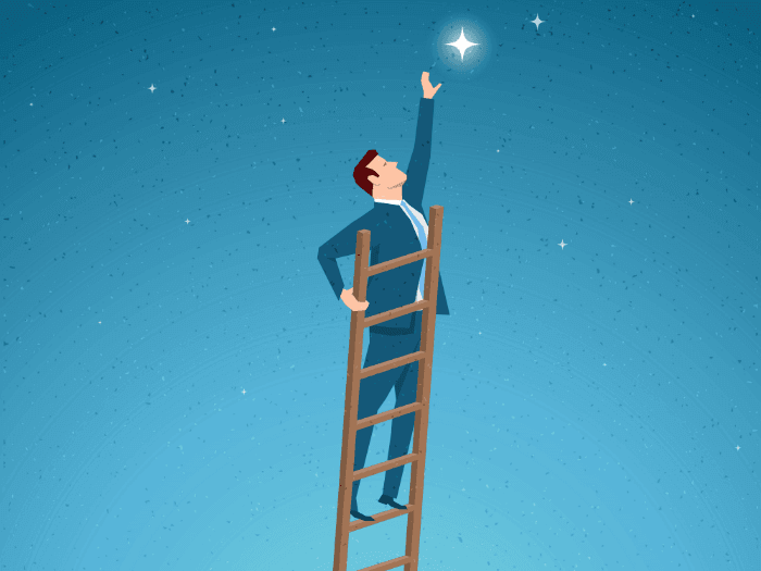 image of a man reaching for a star symbolizing his dream job