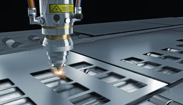 image of a laser cutting metal