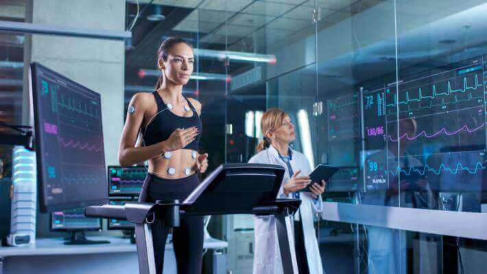 image of woman running on treadmill
