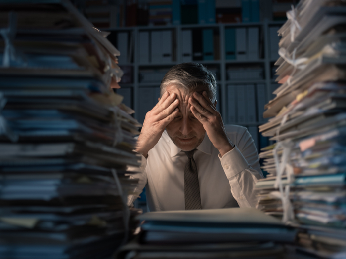 overloaded guy at work