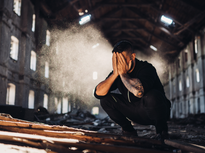 Man experiencing trauma, sadness.