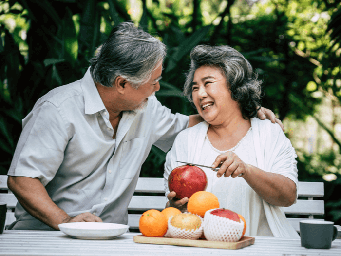 elderly couple and fruit