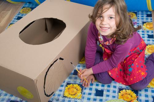 Child building car