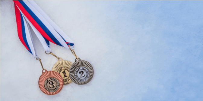 Photo of winter Olympic medals on ice