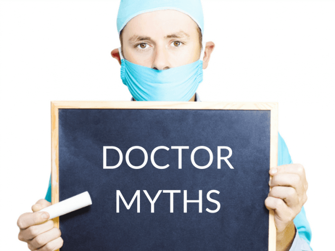 IMAGE OF Doctor holding up sign that reads 'doctor myths'