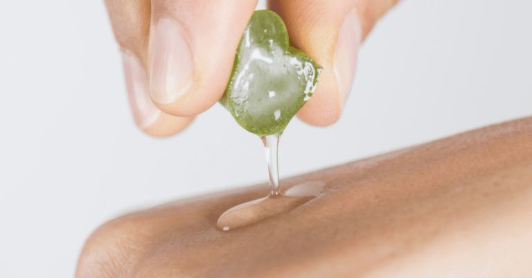 aloe vera being squeezed out on to skin