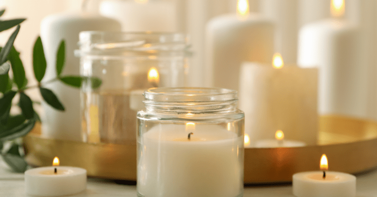 a bunch of lit candles on a table