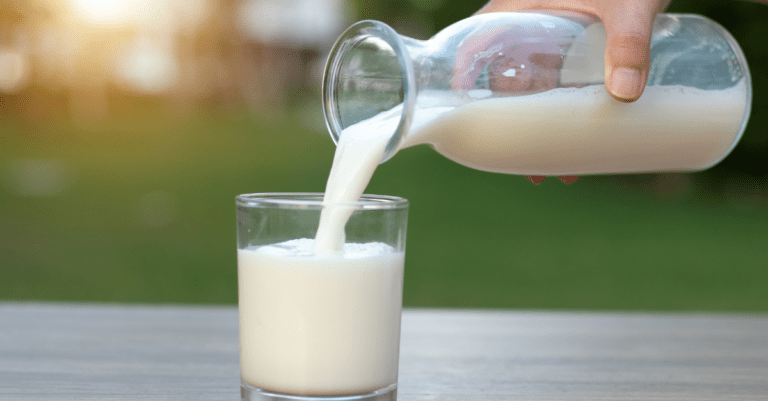 pouring milk into a glass