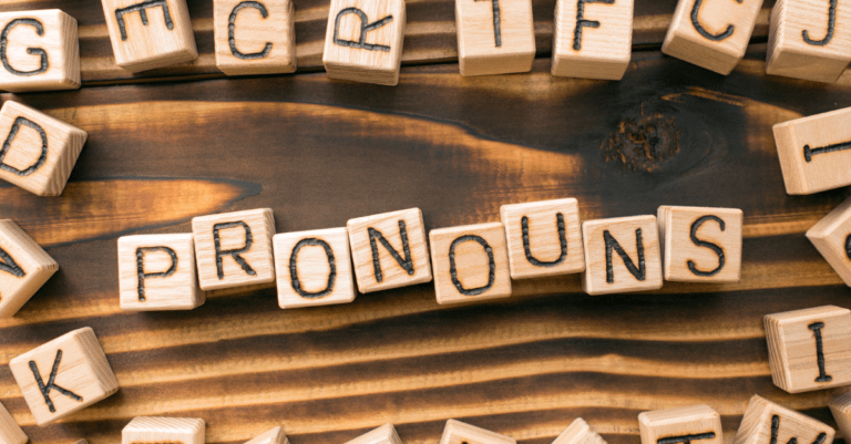 the word pronouns spelled out using letter blocks