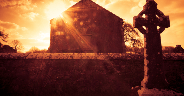 A Celtic symbol in front of an ancient building