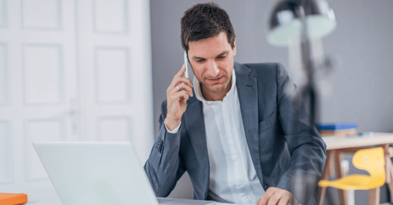 a businessman taking a call