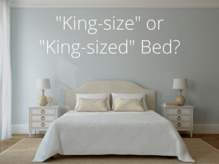 a photo of a bed with the words "king-size" or "king-sized" bed?