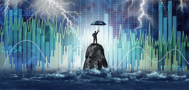 Person standing on tall rock with umbrella over head. Background graphics of stock market ups and downs, lightening, stormy water.