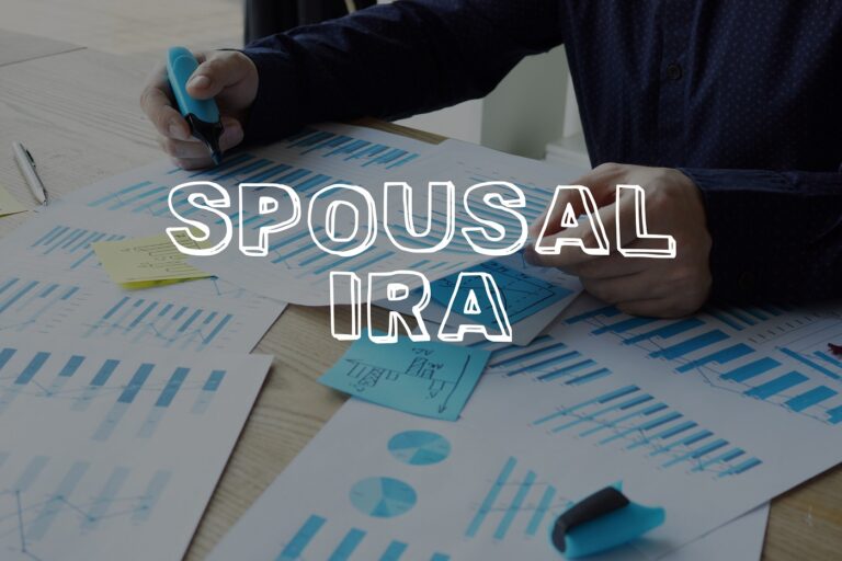 The words "spousal IRA" over a bunch of charts and graphs on papers